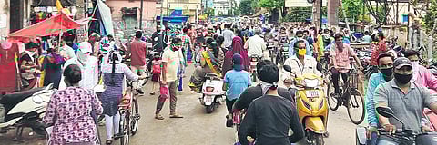 People ignore social distancing while shopping at City Hospital Road in Cuttack. (File photo| EPS)