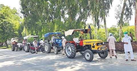 The protesting farmers had parked hundreds of tractors on the highway on Monday | Express