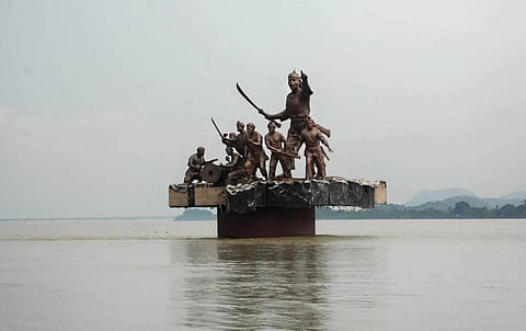 The water level of Brahmaputra River rises to the base of the 1671 Saraighat memorial as the river swells due to incessant rains at Machkhowa in Guwahati Tuesday July 21 2020. (Photo | PTI)