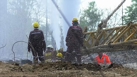 Firefighters at Baghjan oil field in Assam (Photo | EPS)