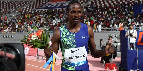 Kenya's Elijah Motonei Manangoi celebrates after winning the men's 1500m during the IAAF Diamond League competition on May 2019 in Doha. (File photo| AFP)
