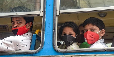 Commuters travel in a bus during Unlock 2.0 in Kolkata Wednesday July 22 2020. (Photo | PTI)