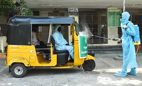 An auto at a covid care centre gets disinfected in Chennai. (Photo | Ashwin Prasath, EPS)