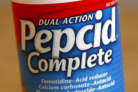 This June 15, 2020 photo shows a bottle of Pepcid antacid in Washington. (Photo | AP)