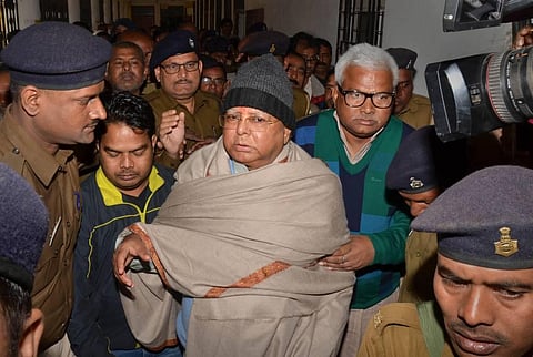 RJD chief Lalu Prasad Yadav has not shown any symptoms of COVID-19 so far, say his doctors at RIMS in Ranchi. (File Photo | PTI)