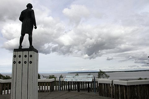 The Captain James Cook statue facing the inlet that bears his name and fronts Alaska's largest city in downtown Anchorage, Alaska is seen on June 23, 2020. (Photo | AP)