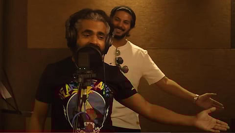 Dulquer Salmaan and Jacob Gregory in 'Unnimaya song'. (Photo | YouTube Screengrab)