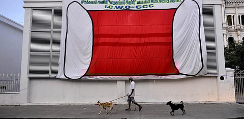 A giant poster of a mask installed by the Greater Chennai Corporation near Ripon Building in Chennai. (Photo | Debadatta Mallick, EPS)