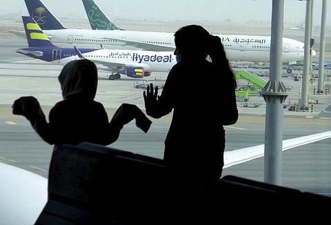 Passengers watch aircraft on the tarmac as they wait for their flight at the King Abdulaziz International Airport in Jiddah, Saudi Arabia, Tuesday, July 28, 2020. (Photo | AP)