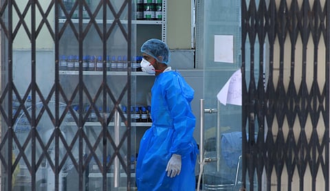 Medical staff wearing PPE rest at a testing centre which provides rapid antigen testing for COVID-19. (Photo| EPS/ Shekhar Yadav)