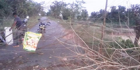 The entrance to Katapali village blocked with barbed wire and branches of trees. (Photo| EPS)
