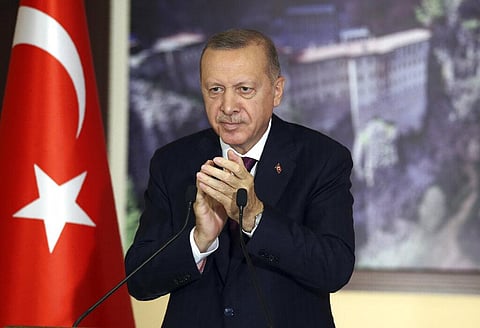 Turkey's President Recep Tayyip Erdogan applauds during a conference in Istanbul, Tuesday, July 28, 2020. (Photo | AP)