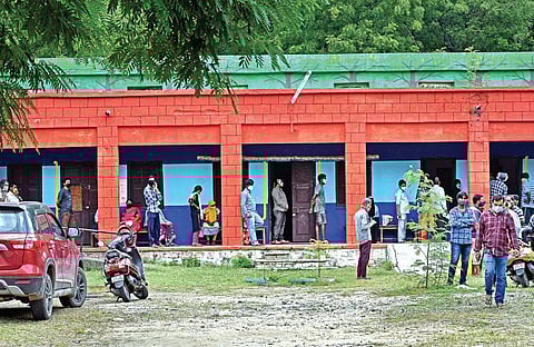 People queue up to get tested for Covid-19 at a government school in Bowenpally, Secunderabad, on Wednesday. Around 60 samples are collected every day at the school-turned-testing centre | S Senbagapa
