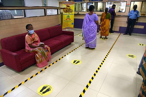 Women adhere to social distancing norms in a Bank in Chennai. (Photo | R Satish Babu, EPS)