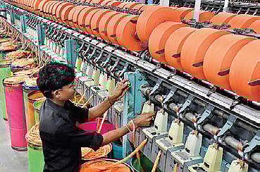 Reverse migration, dip in demand hit spinning mills
