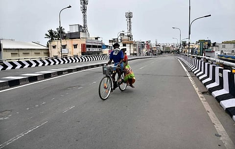 A cyclist crosses the deserted flyover at Porur junction while Chennai observes complete lockdown before starting its Unlock 2. (Photo | P Jawahar, EPS)