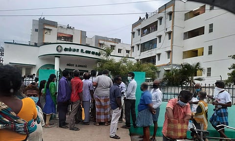 Residents queueing up outside an Amma Canteen in Chennai