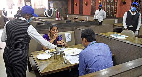 Customers dining at a restaurant at Connaught Place in New Delhi.(Photo | Parveen Negi, EPS)