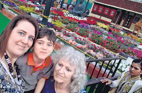 Dana Kursh (extreme left) with her son and mother at the Lalbagh flower show in 2019