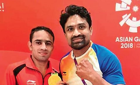 CA Kuttappa (R) & Amit Panghal