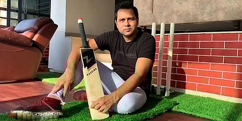 Z-Bat's new co-founder Aakash Chopra poses with the Z-Bat. (Photo| EPS)