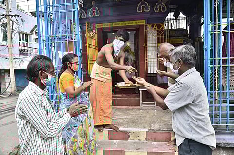 Devotees at Vinayaka temple at Padi after the government allowed to open small shrines in Chennai, on Monday (Photo | EPS/P Jawahar)
