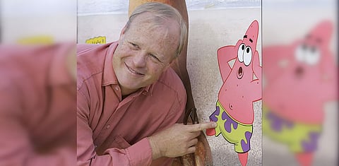 Bill Fagerbakke (L) with a cutout of 'Patrick Star'. (Photo| IMDb)