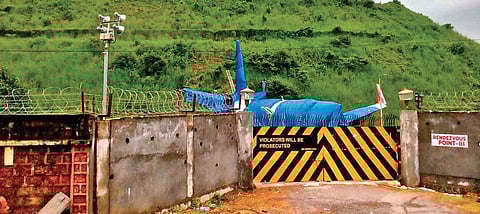 The crashed Air India flight seen covered at the crash site at Karipur on Monday