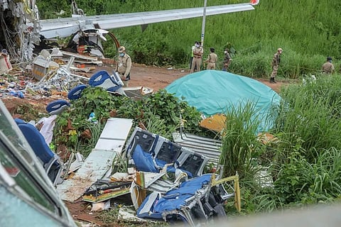 The Air India Express flight from Dubai with 190 people, including a six-member crew, overshot the tabletop runway during landing at the Kozhikode airport in heavy rains on Friday. ( File Photo | PTI)