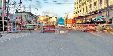 Barricades put up on a road to enforce shutdown in Odisha's Berhampur . (Photo | EPS)