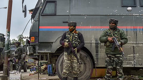 File photo of security personnel standing guard during an encounter with the militants in Jammu and Kashmir.