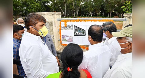 Mayor Bonthu Rammohan along with MLA Subhas Reddy laying foundation stones for six theme parks at Kapra on Wednesday. (Photo | Express)