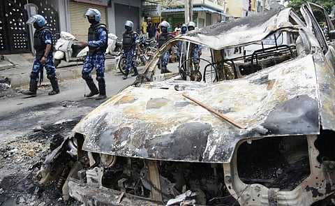 RAF carry out flag march in the riot-hit area after a mob went on a rampage on Tuesday over a social media post allegedly posted by a Congress MLA's relative in Bengaluru. (Photo | Vinod Kumar T/EPS)
