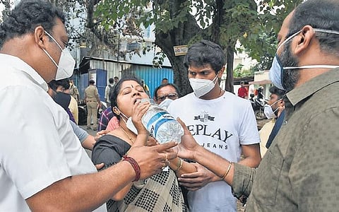 Congress MLA Akhanda Srinivasa Murthy’s wife was inconsolable after seeing the state of their house in Kaval Byrasandra on Thursday | Vinod Kumar T