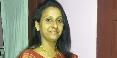 Sherly Joy, the nurse at Poolani PHC who stayed in home isolation after testing positive.