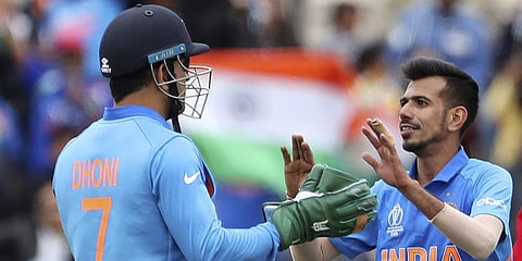 MS Dhoni (L) and Yuzvendra Chahal (File photo| AP)