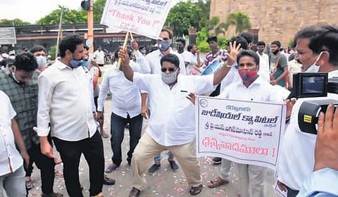 An activist breaks out into an impromptu dance unable to contain his excitement after the Governor gave his assent to the twin Bills. (Photo| EPS)