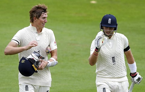 England's captain Joe Root, right, and Zak Crawley walk off the field for lunch during the first day of the third cricket Test match between England and Pakistan. (Photo | AP)
