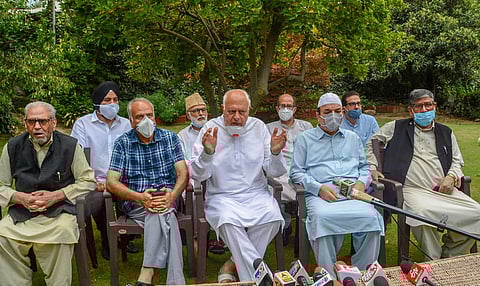 National Conference President Farooq Abdullah addresses a press conference after holding a meeting with party leaders. (Photo| PTI)
