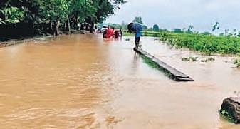 A submerged road of a village in Nabarangpur district | Express