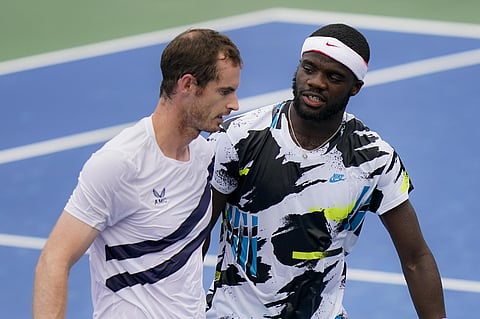 Andy Murray, of the United Kingdom, left, and Frances Tiafoe, of the United States, meet at the net after Murray won their match at the Western & Southern Open tennis tournament. (Photo | AP)
