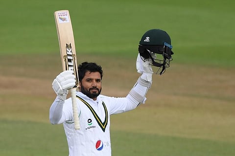 Pakistan's Azhar Ali celebrates after reaching his century on the third day of the third Test cricket match between England and Pakistan. (Photo | AFP)