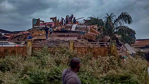 Rescue operations underway after a five-storeyed residential building collapsed in Raigad. (Photo| PTI)