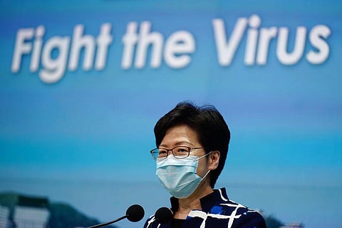 Hong Kong Chief Executive Carrie Lam listens to reporters' questions during a press conference on Tuesday (Photo | AP)