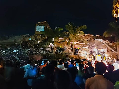 Rescue operations underway after a five-storeyed residential building collapsed in Raigad district of Maharashtra Monday Aug. 24 2020. (Photo | PTI)