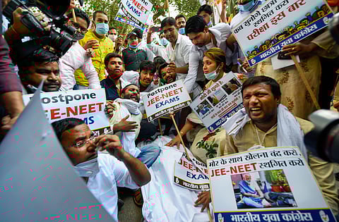 Indian Youth Congress workers stage a protest outside the HRD Ministry for organising JEE-NEET Examination amid COVID-19 pandemic in New Delhi. (Photo | PTI)