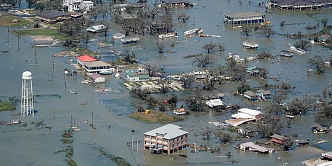 Buildings and homes near Lake Charles are flooded in the aftermath of Hurricane Laura. (Photo| AP)