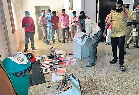 Files scattered around after fire broke out at the Secretariat building housing the General Administration Department and the protocol section. (Photo | Express)