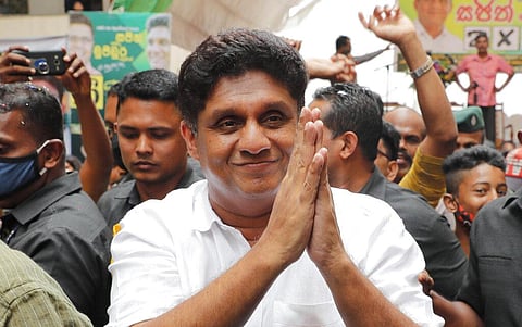 Sri Lanka's main opposition party leader Sajith Premadasa, greets supporters as he arrives for an election campaign in Colombo, Sri Lanka, Sunday, Aug. 2, 2020. (Photo | AP)