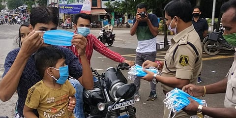 Raigarh police force distributing of face masks to people as part of awareness drive.